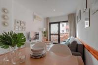 Posedenie v ubytovaní Apartamento 303 junto a la playa piscina y parking