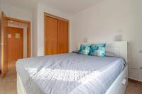 Posteľ alebo postele v izbe v ubytovaní Apartamento 303 junto a la playa piscina y parking