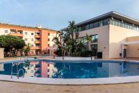 Bazén v ubytovaní Apartamento 303 junto a la playa piscina y parking alebo v jeho blízkosti