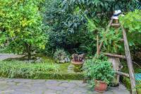 Vonkajšia záhrada v ubytovaní Apartment Sorrento 1