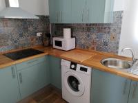 Kuchyňa alebo kuchynka v ubytovaní Apartamentos Cala San Pedro