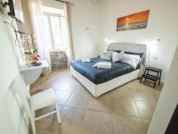 A bed or beds in a room at Civico 47