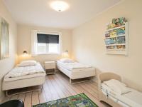 Postel nebo postele na pokoji v ubytování 10 person holiday home in Rødvig Stevns-By Traum
