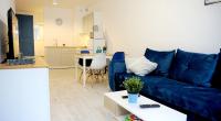 Posedenie v ubytovaní Aura Apartament