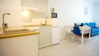 Kuchyňa alebo kuchynka v ubytovaní Aura Apartament