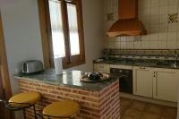 Kuchyň nebo kuchyňský kout v ubytování Casa Rural La Encebra