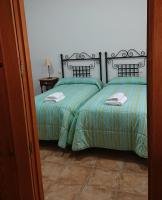 Postel nebo postele na pokoji v ubytování Casa Rural La Encebra