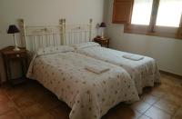 Postel nebo postele na pokoji v ubytování Casa Rural La Encebra