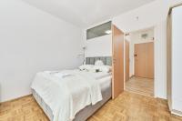 Posteľ alebo postele v izbe v ubytovaní Apartments Wrocław Legnicka by Noclegi Renters