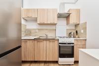 Kuchyňa alebo kuchynka v ubytovaní Apartments Wrocław Legnicka by Noclegi Renters