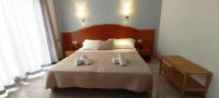 Posteľ alebo postele v izbe v ubytovaní Hotel Bonsol