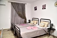Postel nebo postele na pokoji v ubytování PLUMERIA HOUSE