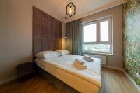 Łóżko lub łóżka w pokoju w obiekcie Apartament Luxury Two-bedroom