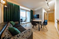 Telewizja i/lub zestaw kina domowego w obiekcie Apartament Luxury Two-bedroom