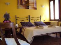 Posteľ alebo postele v izbe v ubytovaní Casa di Campagna B&B La Corte Ferrara