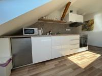 Kuchyň nebo kuchyňský kout v ubytování Apartmány Skryjova