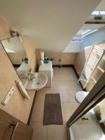 Koupelna v ubytování Apartmány Skryjova