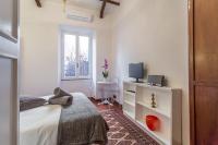 A bed or beds in a room at Sora Menica Twin