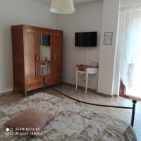 Televízia a/alebo spoločenská miestnosť v ubytovaní Agriturismo La Ca' d'Amelio