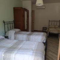 Posteľ alebo postele v izbe v ubytovaní Agriturismo La Ca' d'Amelio
