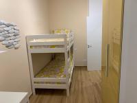 Posteľ alebo postele v izbe v ubytovaní Terre d’Aci Apartments casa Peppe