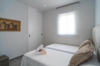 Postel nebo postele na pokoji v ubytování AAC Málaga - Apartamento con terraza, muy amplio, totalmente equipado, cerca del centro y nuevo!