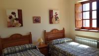 Postel nebo postele na pokoji v ubytování Casa Rural Valle Tosande