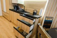 Kuchyňa alebo kuchynka v ubytovaní Apartament Szymanówka Karpacz