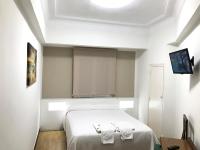 Posteľ alebo postele v izbe v ubytovaní Hostal La Mexicana