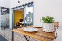 Televízia a/alebo spoločenská miestnosť v ubytovaní Precioso Ático de diseño, gran Terraza de 35 m2 y de 16 m2 y Garaje en pleno Centro