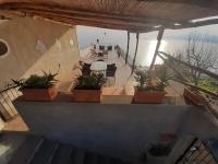 A balcony or terrace at Giardino Eden Villa