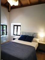 Cama o camas de una habitación en Huerto San Antonio