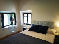 Cama o camas de una habitación en Huerto San Antonio