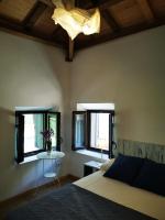 Cama o camas de una habitación en Huerto San Antonio