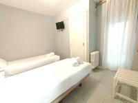 Postel nebo postele na pokoji v ubytování Hostal Albero by gaiarooms
