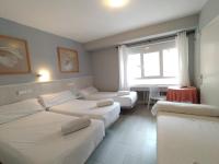 Postel nebo postele na pokoji v ubytování Hostal Albero by gaiarooms