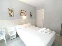Postel nebo postele na pokoji v ubytování Hostal Albero by gaiarooms