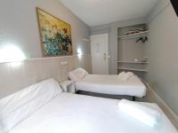 Postel nebo postele na pokoji v ubytování Hostal Albero by gaiarooms