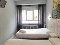 Postel nebo postele na pokoji v ubytování Hostal Albero by gaiarooms