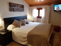 Postel nebo postele na pokoji v ubytování Hotel Sant Roc