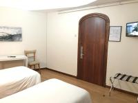 Posteľ alebo postele v izbe v ubytovaní Hostal La Mexicana