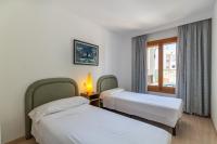 Łóżko lub łóżka w pokoju w obiekcie Can Picafort - 32631 Mallorca