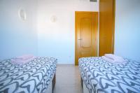 Postel nebo postele na pokoji v ubytování 122 Perfect Apart - Alicante Holiday