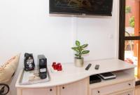 Telewizja i/lub zestaw kina domowego w obiekcie Casa Isabel, the perfect home for your holidays in Corralejo