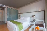Postel nebo postele na pokoji v ubytování Best Western Patong Beach