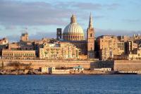 a view of a city from the water at Modern 2 Bedroom Maisonette in Central Sliema in Sliema