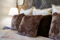 A bed or beds in a room at R7 Design Apartment - hostAID