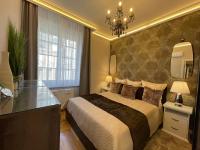 A bed or beds in a room at R7 Design Apartment - hostAID