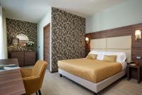 Posteľ alebo postele v izbe v ubytovaní Hotel Spigamonti