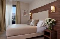 Posteľ alebo postele v izbe v ubytovaní Hotel Spigamonti